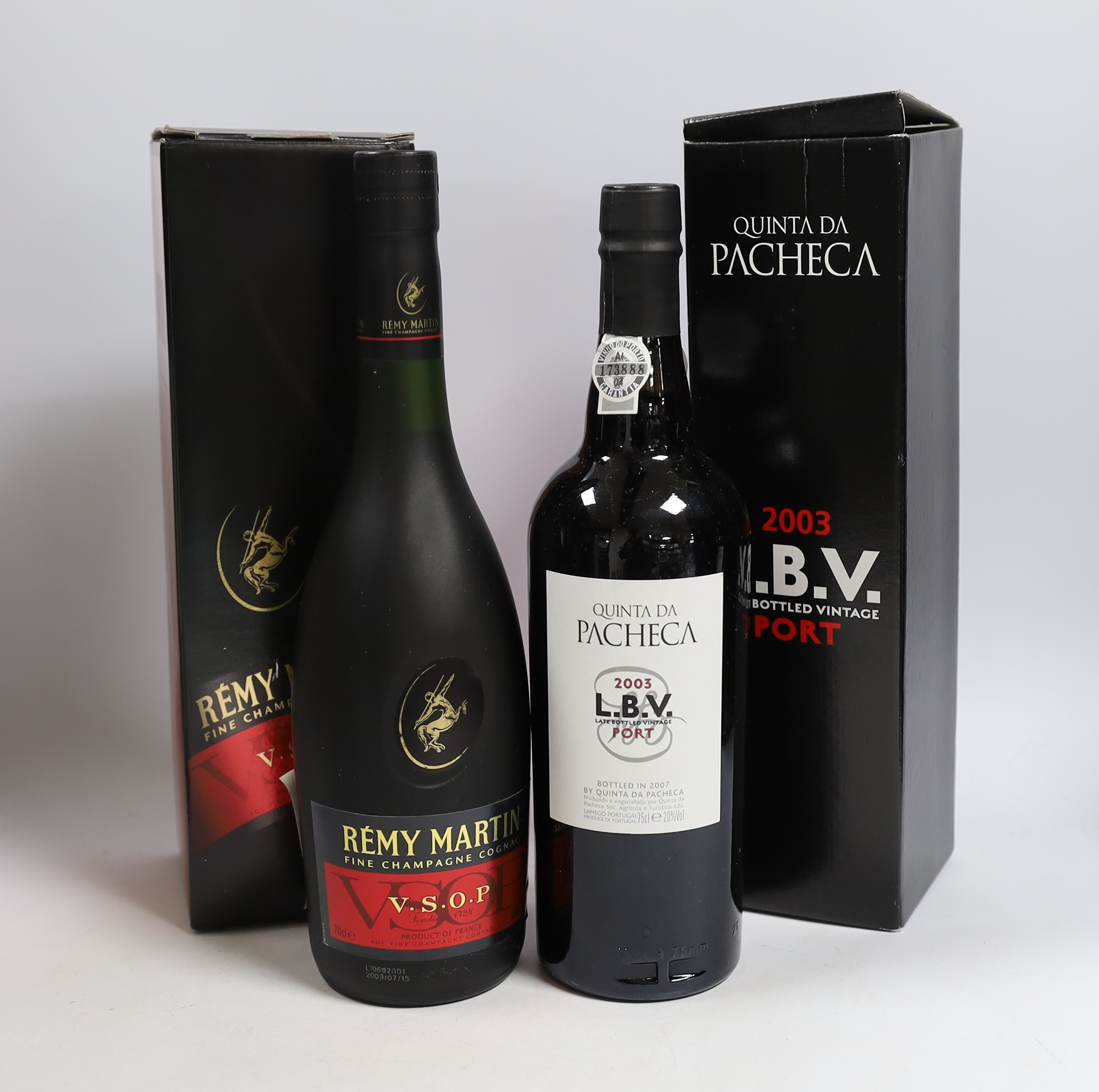 Two half bottles of Cunard LBV Port, both 2003, a Quinta Do Cranston 1997 LBV Port, a bottle of Camus Cognac and a pair of matching glasses both with glass warmers, one boxed bottle of Port 2003 and one boxed bottle of R